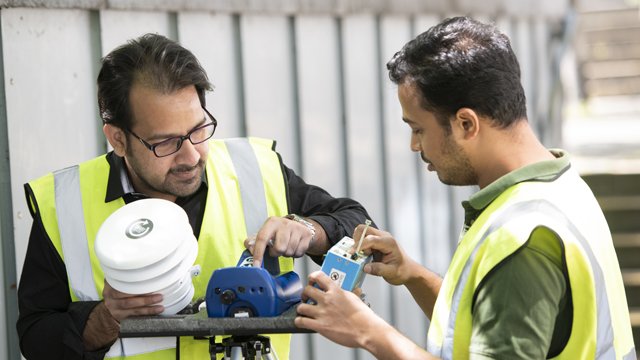 Two people using clean air equipment