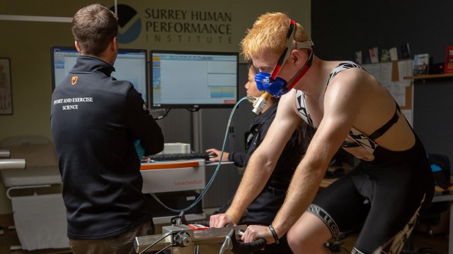 A man being tested on an exercise bike in the Surrey Human Performance Institute.