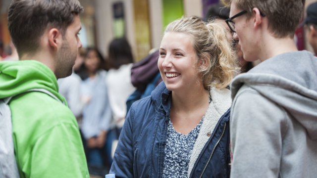 Students smiling and talking together