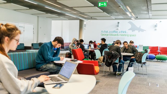 Students in the library working 