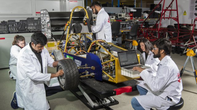 Students building a racing car