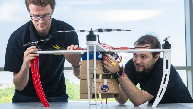 Students building a flying object