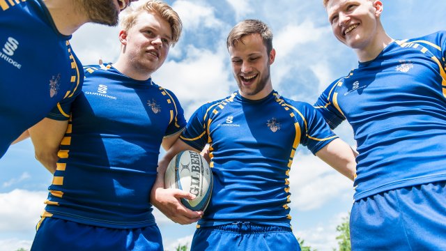 Students playing rugby