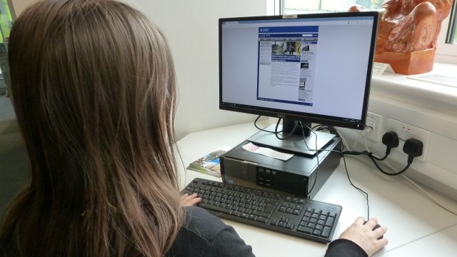 Woman using a computer.