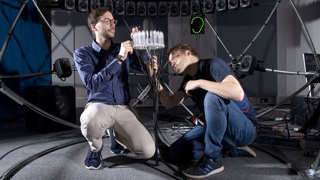 Students using equipment in the sound sphere