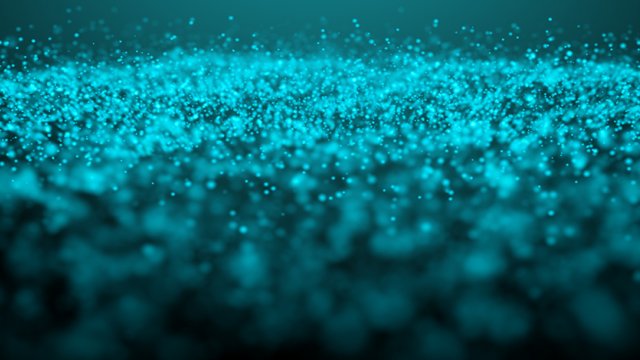 A glowing teal glitter cloud on a dark empty background 