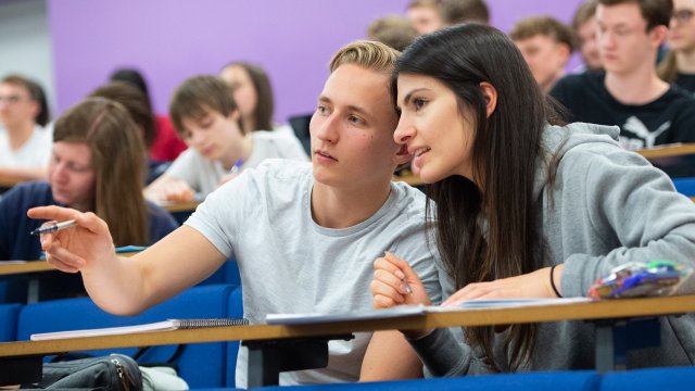 Two students in lecture.