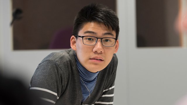 Male student in lecture.