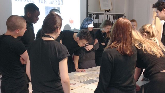 Kids being given teaching support in the archives