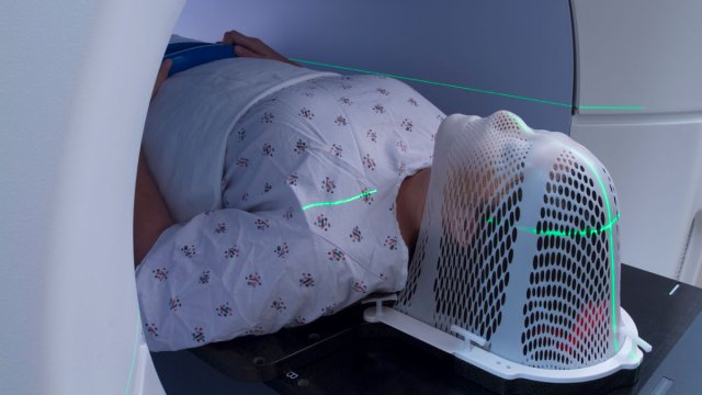Woman getting scan for cancer