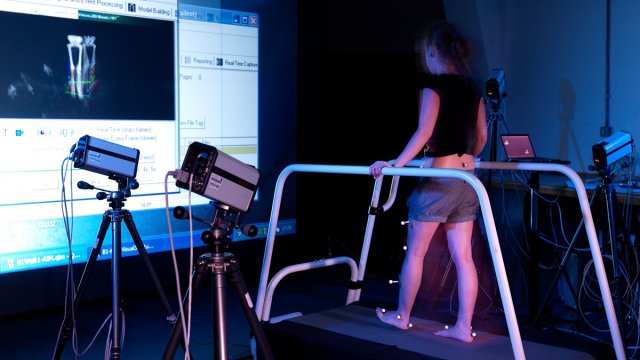 A person on a treadmill in the human movement lab.