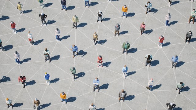 Group of model people standing apart