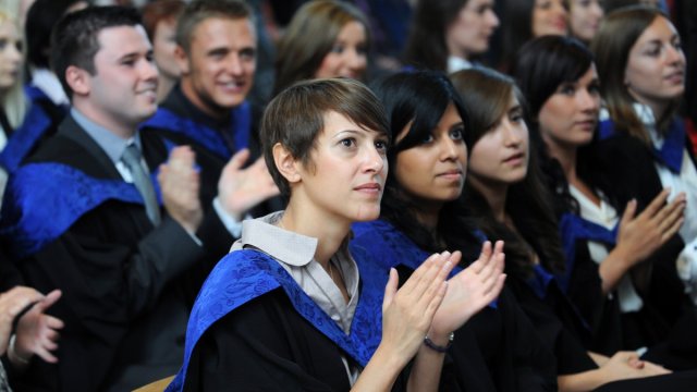 Students applause at graduation 