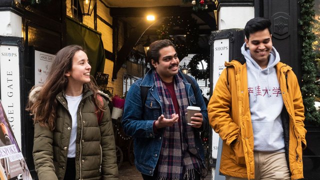 Students walking out of Angel Gate in Guildford town centre