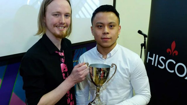 Stewart Hutchins and Kevin Li with their trophy