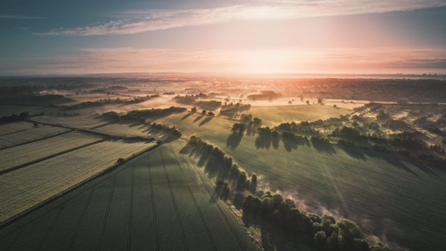 sun shining over landscape - getty image