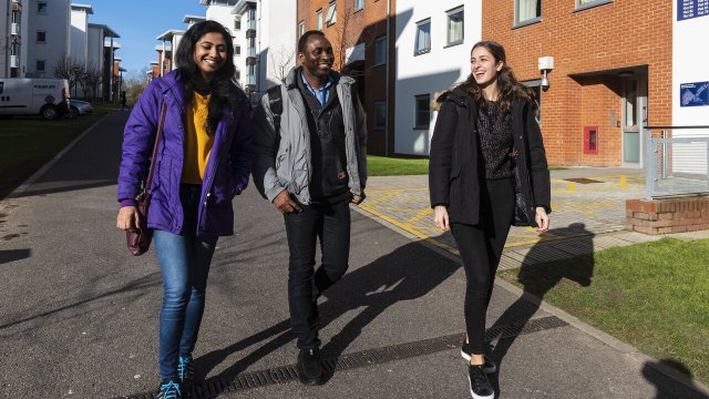 Students walking through Manor Park residences