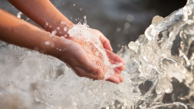 Hands in water