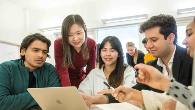Students collaborating at Surrey Business School