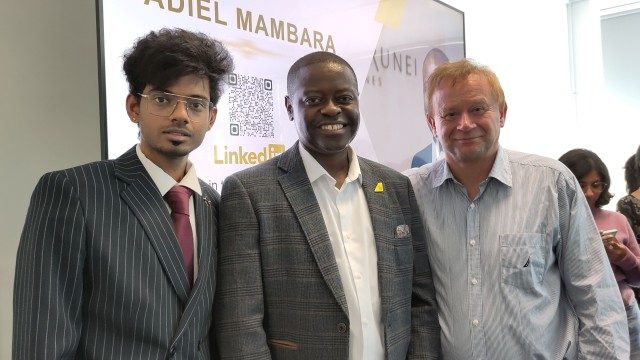 Royal Brunei's Satheesh Durai and Adiel Mambara with University of Surrey's Dr Frankie O'Connell at Air Transport Management MSc careers talk