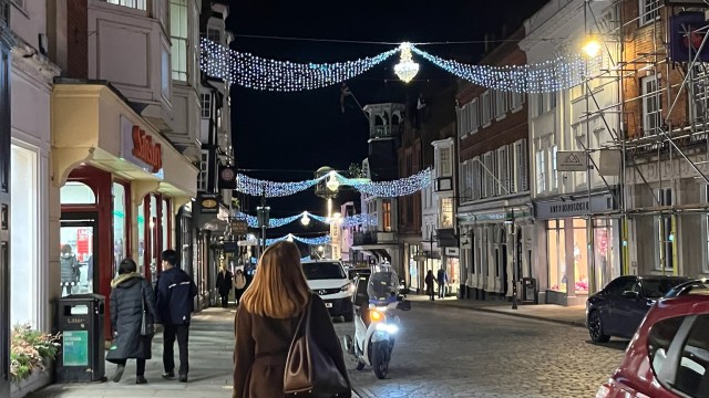 University of Surrey modern languages BSc student, Amelia, walking in Guildford High Street at night