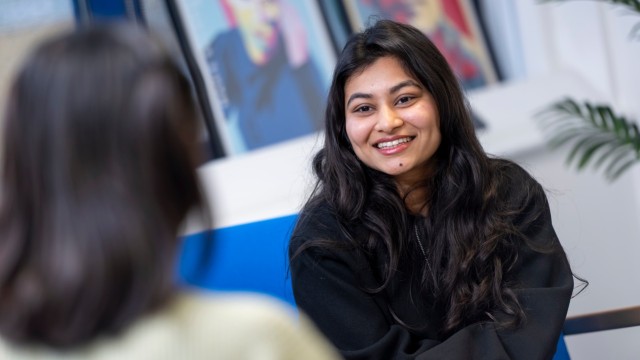 Student discussing scholarships on Surrey campus
