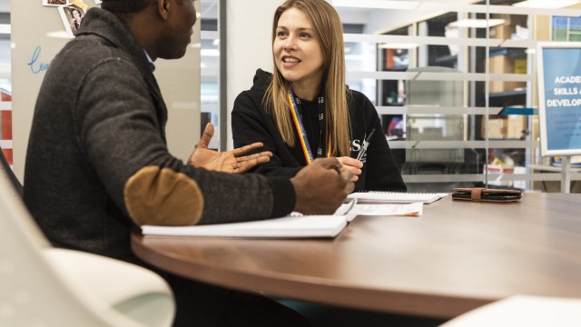 Students studying in library