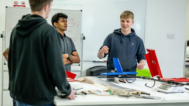 Undergraduate aerospace students in workshop