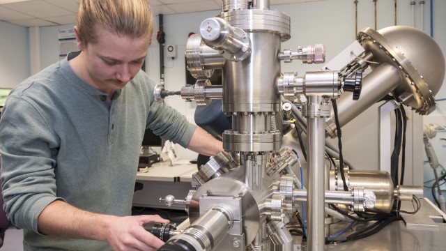 Postgraduate research students using equipment in MSSU/SAL facility in the School of Engineering