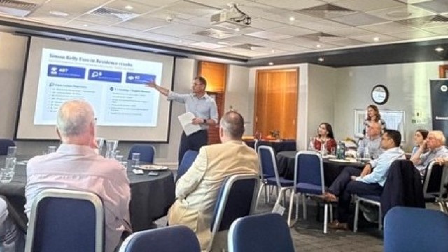 Guests listening to a presentation at Surrey Business School's Celebrating Partners event on 24 June 2026