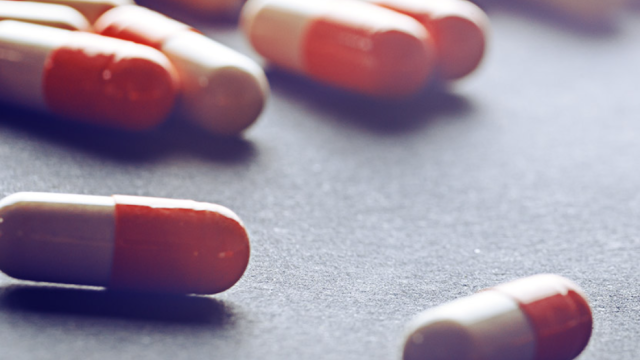 image of pills from lab research in UGPN