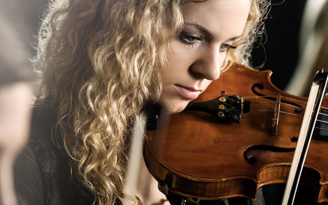 Women playing violins