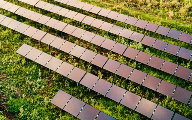 Grass field with solar panels