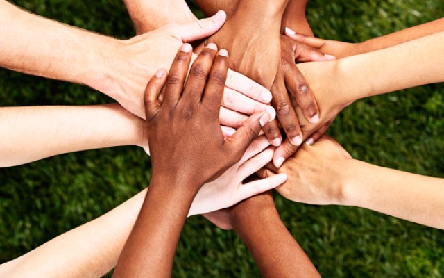 Hands on top of hands
