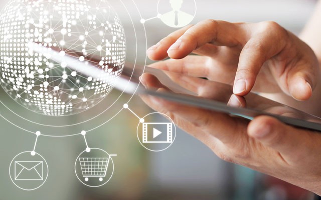 Person using phone with icons coming out of it