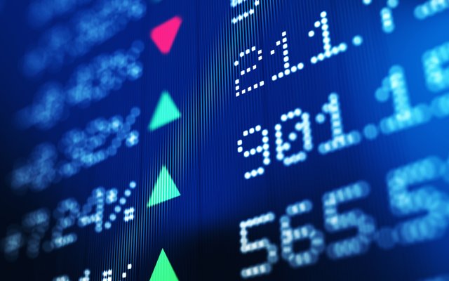 Financial data shown on a board