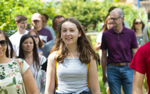 A group of students and their parents at the Open day