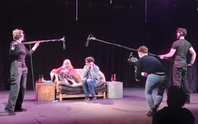 GSA students recording a play on stage