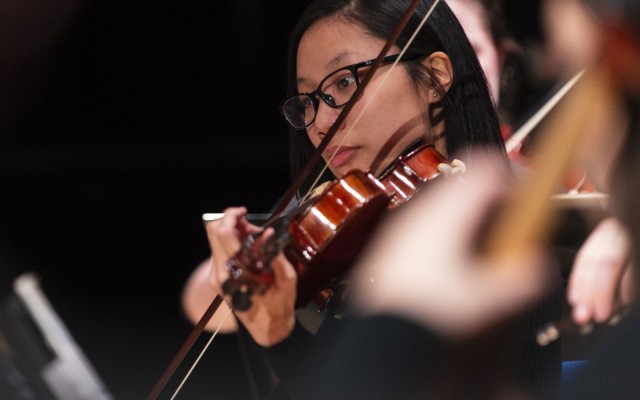 Music student playing violin