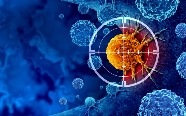 Graphic showing a yellow cancer cell in a cross hair on a blue background