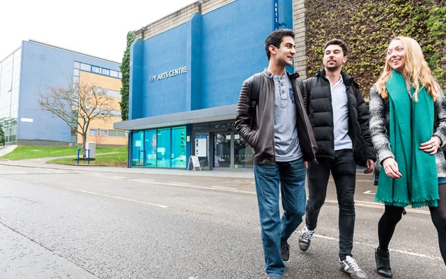 Students walking past the Ivy Arts Centre