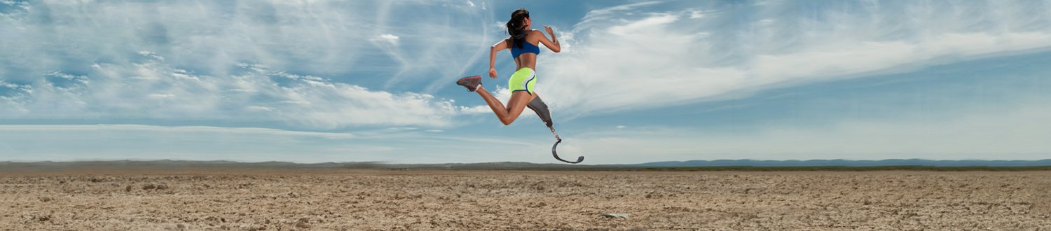 Woman running with biomechanical leg
