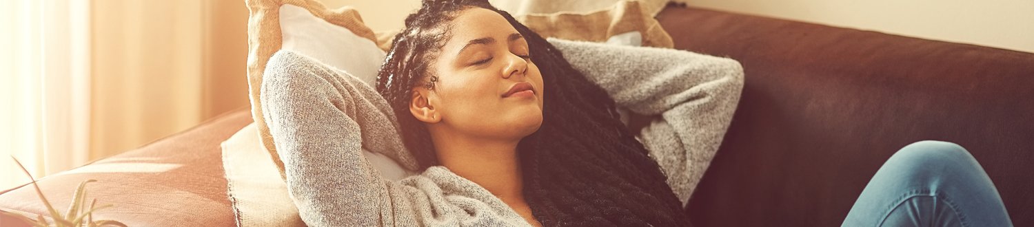 Female napping on sofa