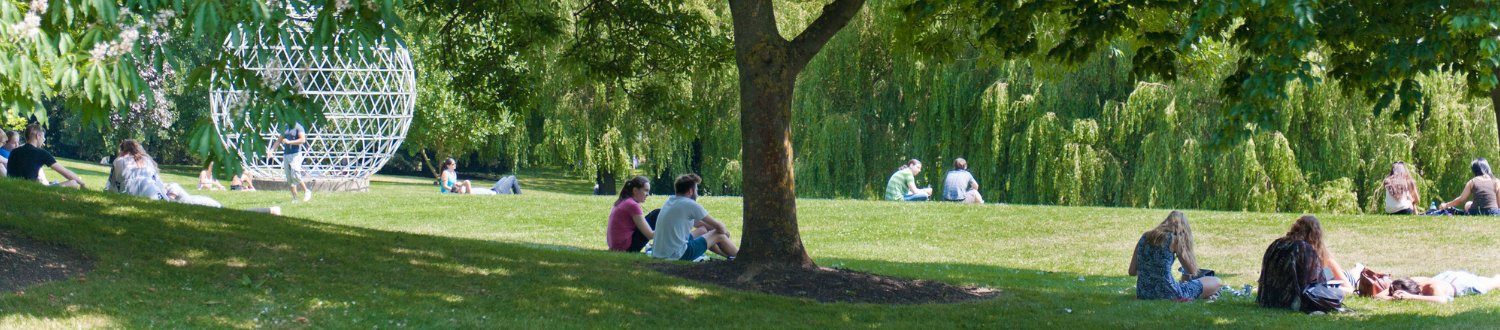 Students sat by lake on campus
