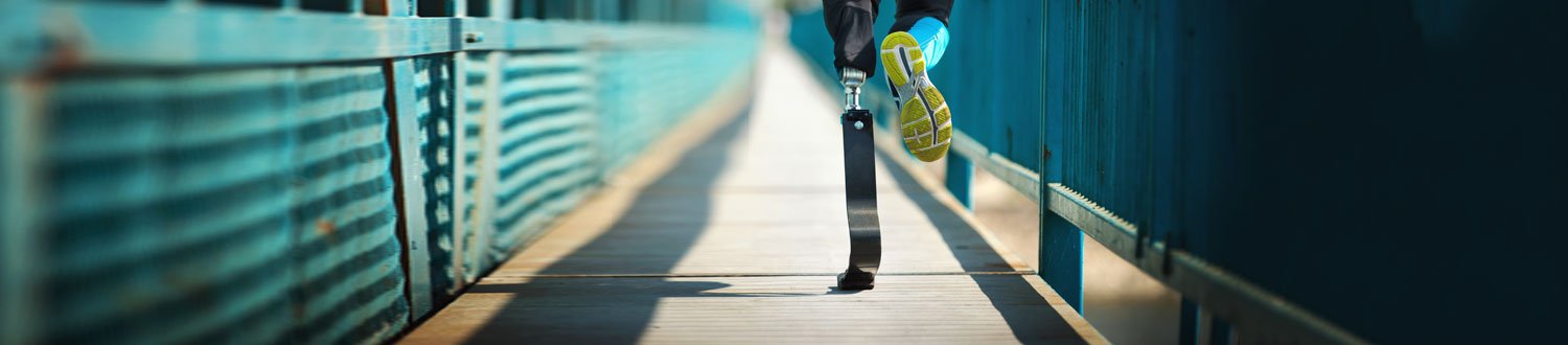 Person running down tunnel wearing a bionic leg