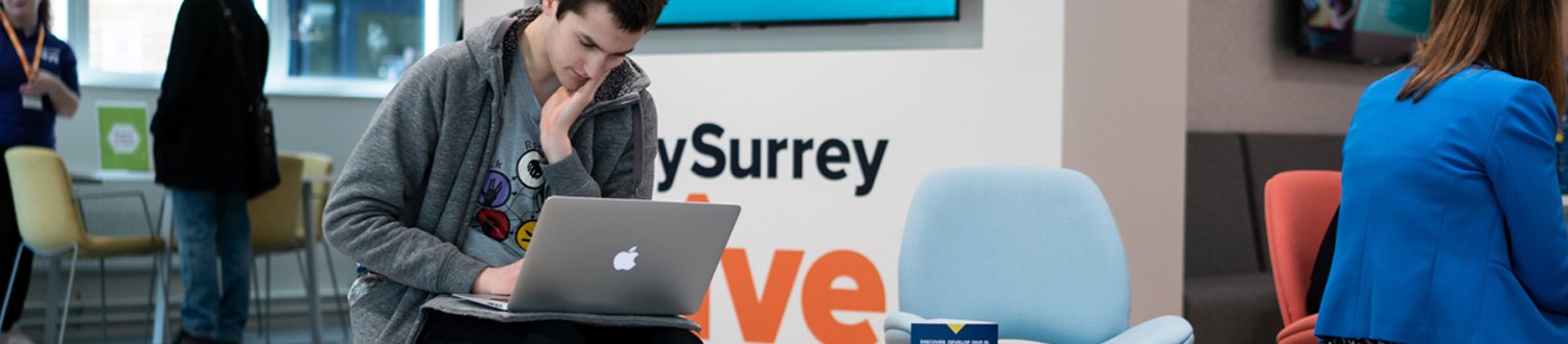 Student working on laptop in The Hive