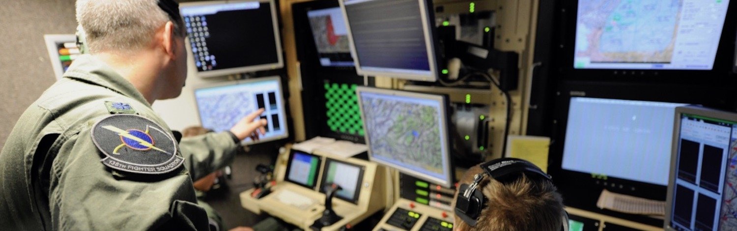 A drone pilot and sensor operator at the controls of a MQ-9 Reaper. nationalguard.mil