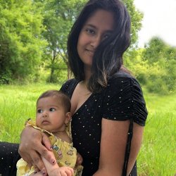 Ranjana Das holding a baby