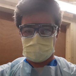 Trainee vet, Jack Church, in PPE.