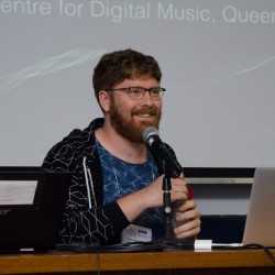 Image of Thomas Deacon giving a presentation
